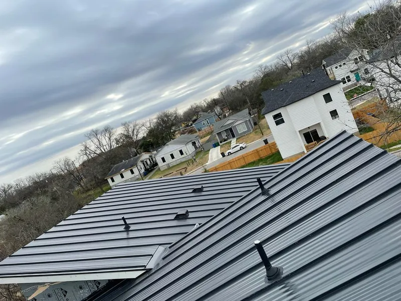 Standing seam metal roof panels with vents for Skylight Repair in St. Gabriel